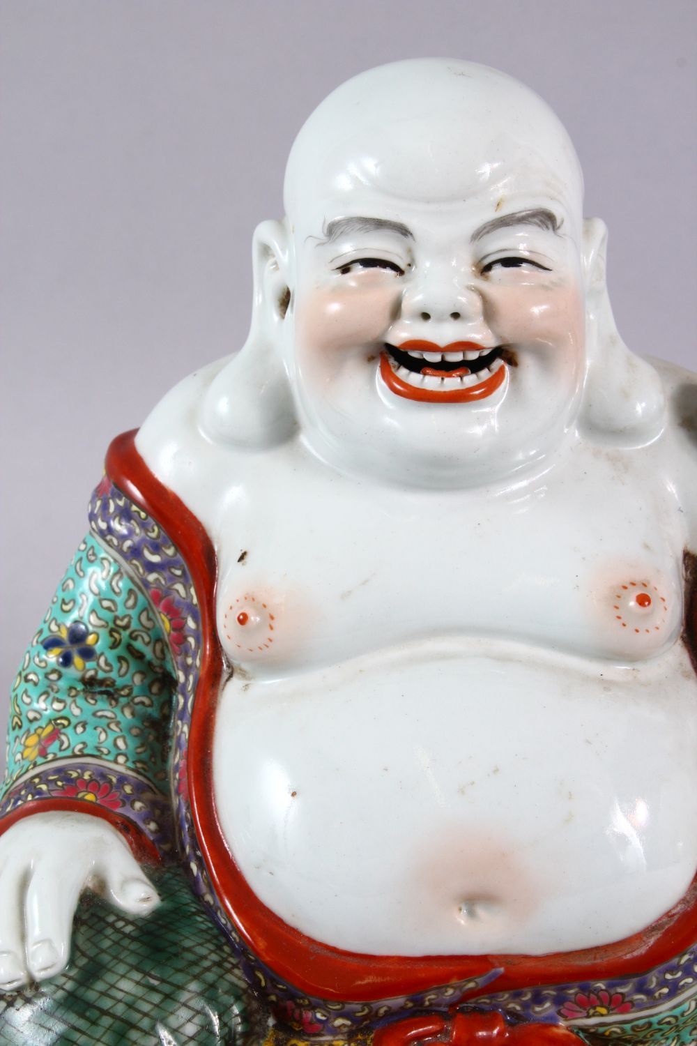 A CHINESE PORCELAIN BUDDHA, holding a scepter. - Image 2 of 7