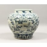 A GOOD CHINESE BLUE AND WHITE MING STYLE BULBOUS VASE with a band of figures and scrolls, 11ins