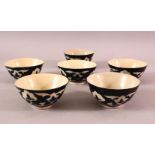 SIX SMALL RUSSIAN POTTERY TEA BOWLS for the Persian market, 8.5cm diameter.