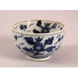A SMALL CHINESE BLUE AND WHITE BOWL, painted with fish and flora, 12cm diiameter, 7.5cm high.