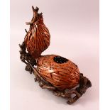 A JAPANESE MEIJI WOVEN DOUBLE GOURD FORMED IKEBANA BASKET, woven in the form of a double gourd, with