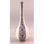 A PERSIAN QAJAR BLUE & WHITE POTTERY VASE, with bands of floral decoration, 41cm