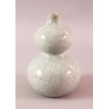 A 19TH / 20TH CENTURY CHINESE CRACKLE GROUND CELADON DOUBLE GOURD PORCELAIN VASE, the base with a