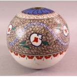 AN IZNIK TURKISH POTTERY HANGING BALL FOR MOSQUE, decorated with a white glaze with motif