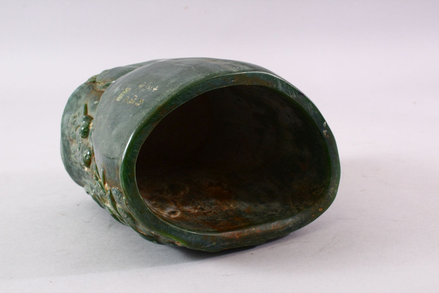 A CHINESE GREEN HARDSTONE BRUSH POT, carved with figures and trees, calligraphy, 15.5cm high. - Image 6 of 7