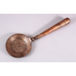 AN 18TH / 19TH CENTURY PERISAN COPPER LADLE / STRAINER, with calligraphic band decoration, 38cm