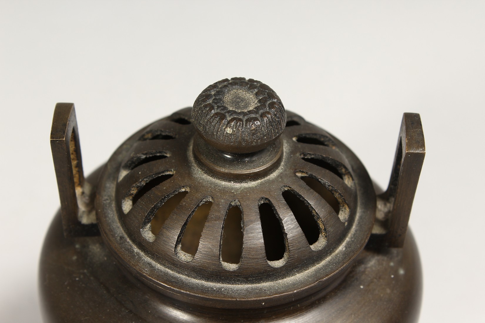 A CHINESE TWO HANDLED BRONZE CENSER AND COVER, 5ins high. - Image 3 of 7