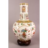A CHINESE FAMILLE ROSE PORCELAIN DRAGON VASE, decorated with dragons, bats and foliage, with