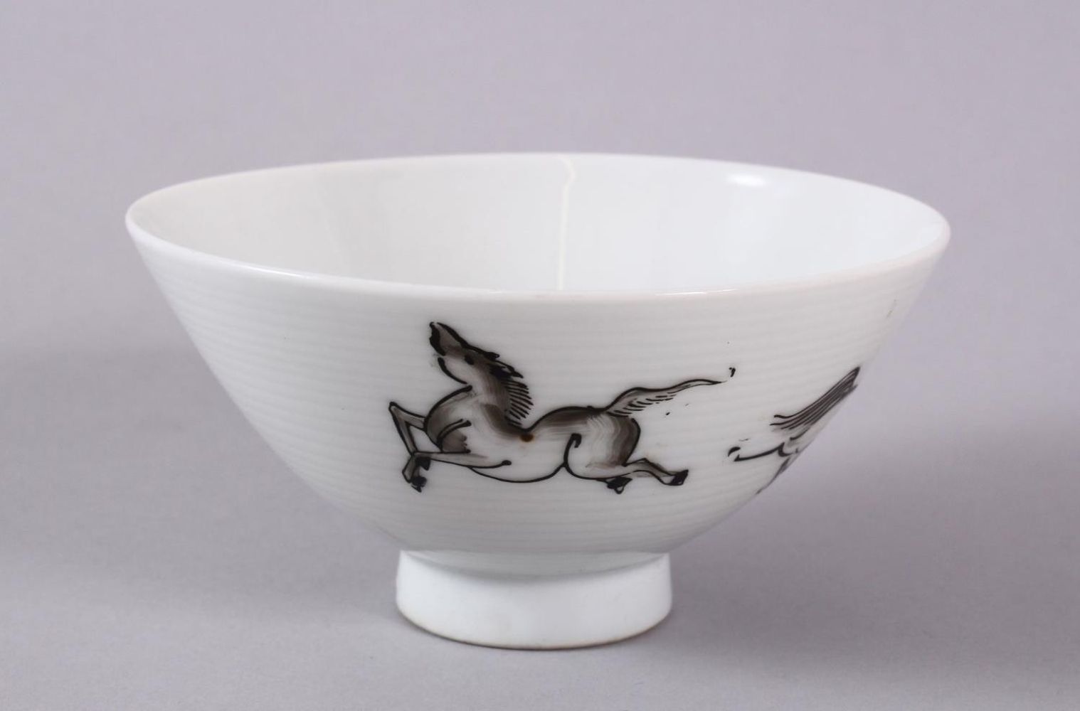 A CHINESE REPUBLIC STYLE PORCELAIN HORSE RICE BOWL, decorated with two horses, with a seal and