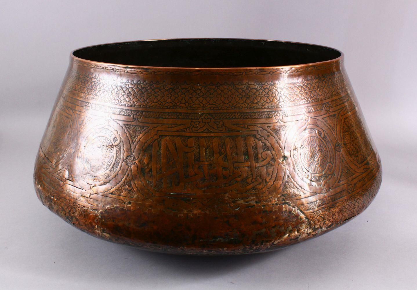 A RARE LARGE 16TH CENTURY MAMLUK DAMASCUS ENGRAVED COPPER BOWL, approx. 56cm diameter at widest