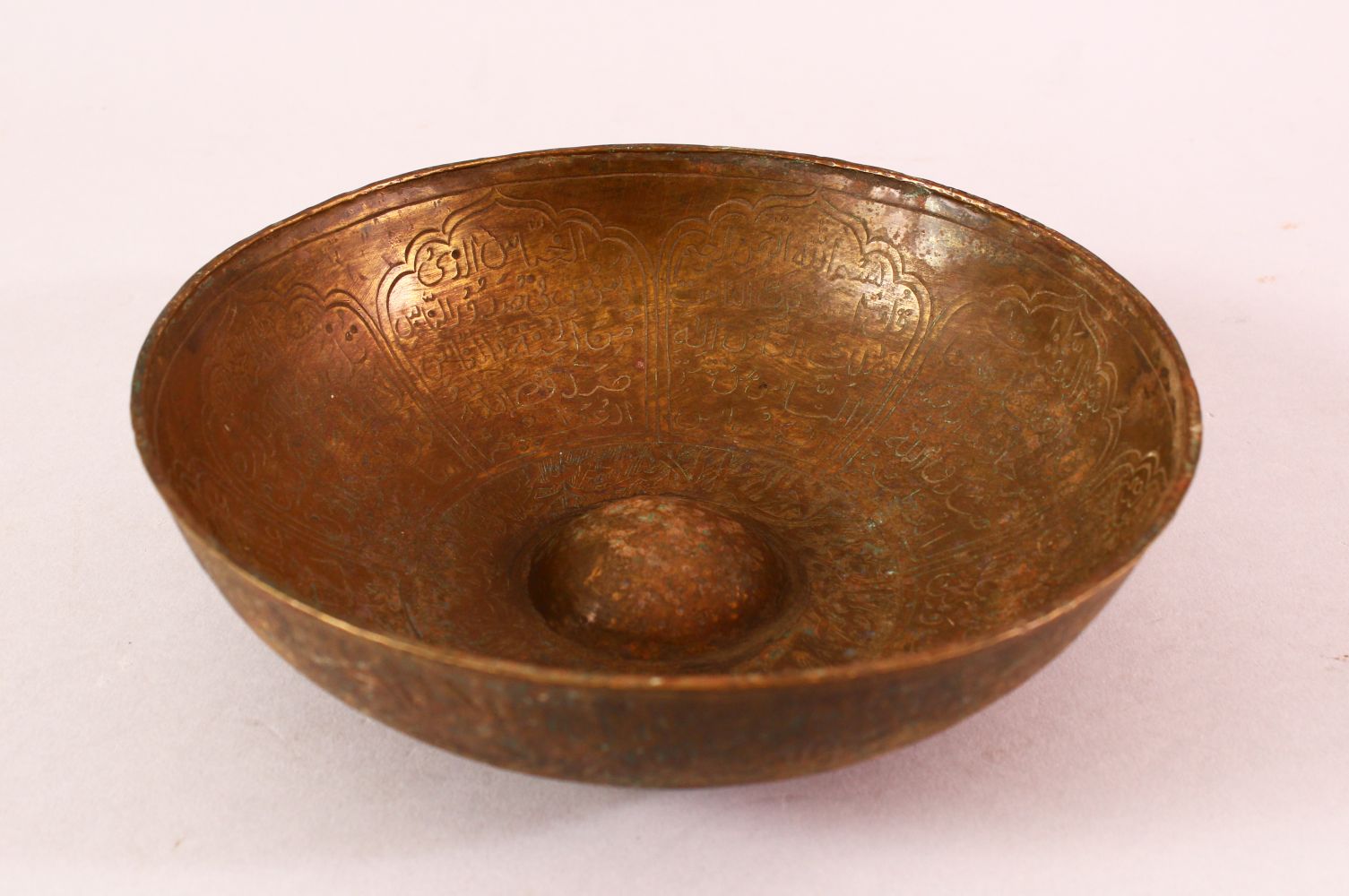 A 17TH/18TH CENTURY INDIAN DECCANI MAGIC BOWL, engraved to the exterior and interior with bands