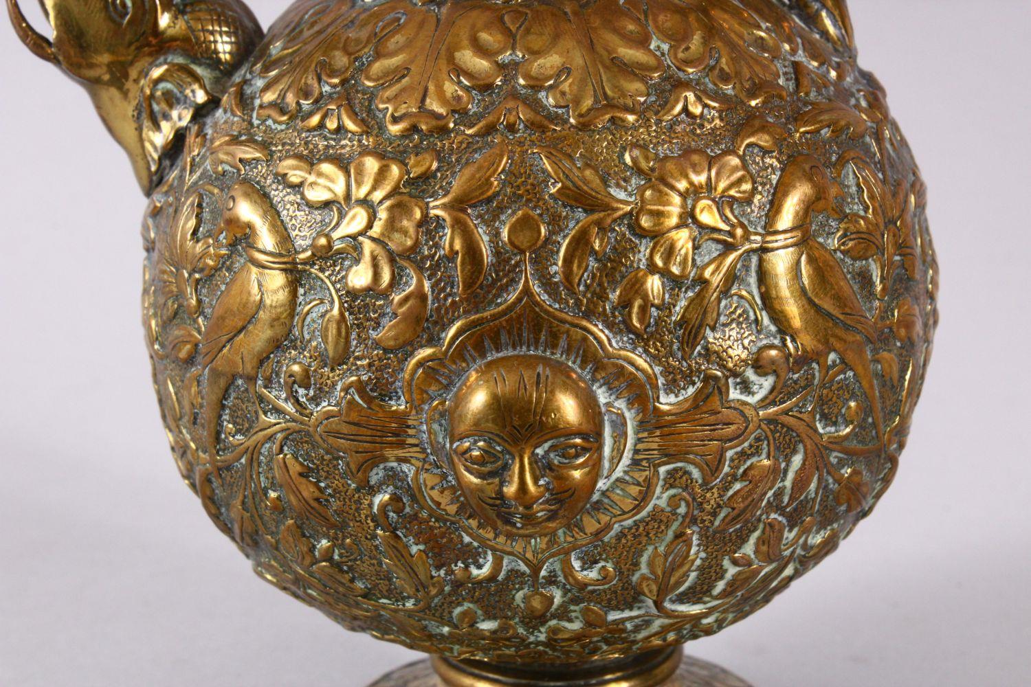 A 19TH CENTURY INDIAN SHIVA BRASS MOULDED EWER, with a stopper, the handle with an animal, the - Image 2 of 8