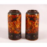 A PAIR OF JAPANESE CLOISONNE VASES OF CYLINDRICAL FORM, gold ground, 15cm high.