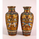 A SMALL PAIR OF CLOISONNE AND RAISED WIRE VASES, 16cm high.