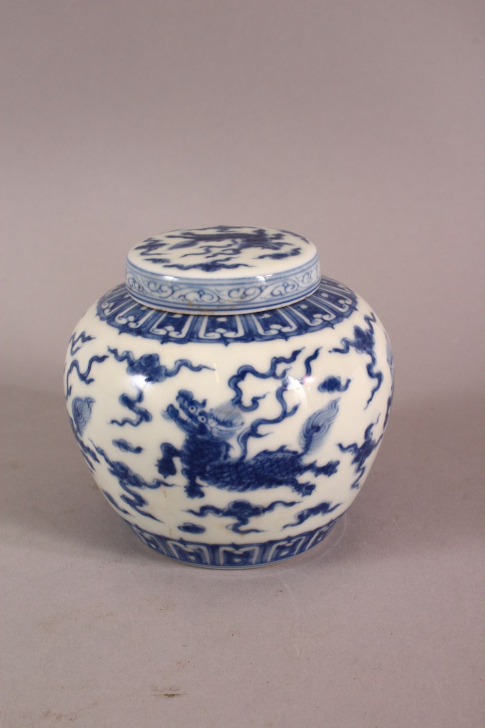 A CHINESE BLUE & WHITE PORCELAIN JAR & COVER, with decoration of kylin and clouds, base with a mark, - Image 3 of 7
