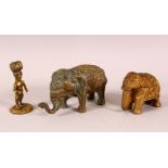 THREE INDIAN GILT METAL FIGURES, two elephant and a figure.