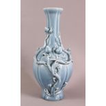 A CHINESE SKY BLUE GLAZED MOULDED PEACH BRANCH PORCELAIN VASE, the body decorated with moulded peach