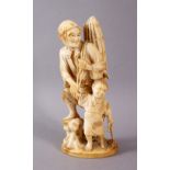 A GOOD QUALITY JAPANESE MEIJI PERIOD CARVED IVORY OKIMONO OF A FISHERMAN AND SON, signed to base,