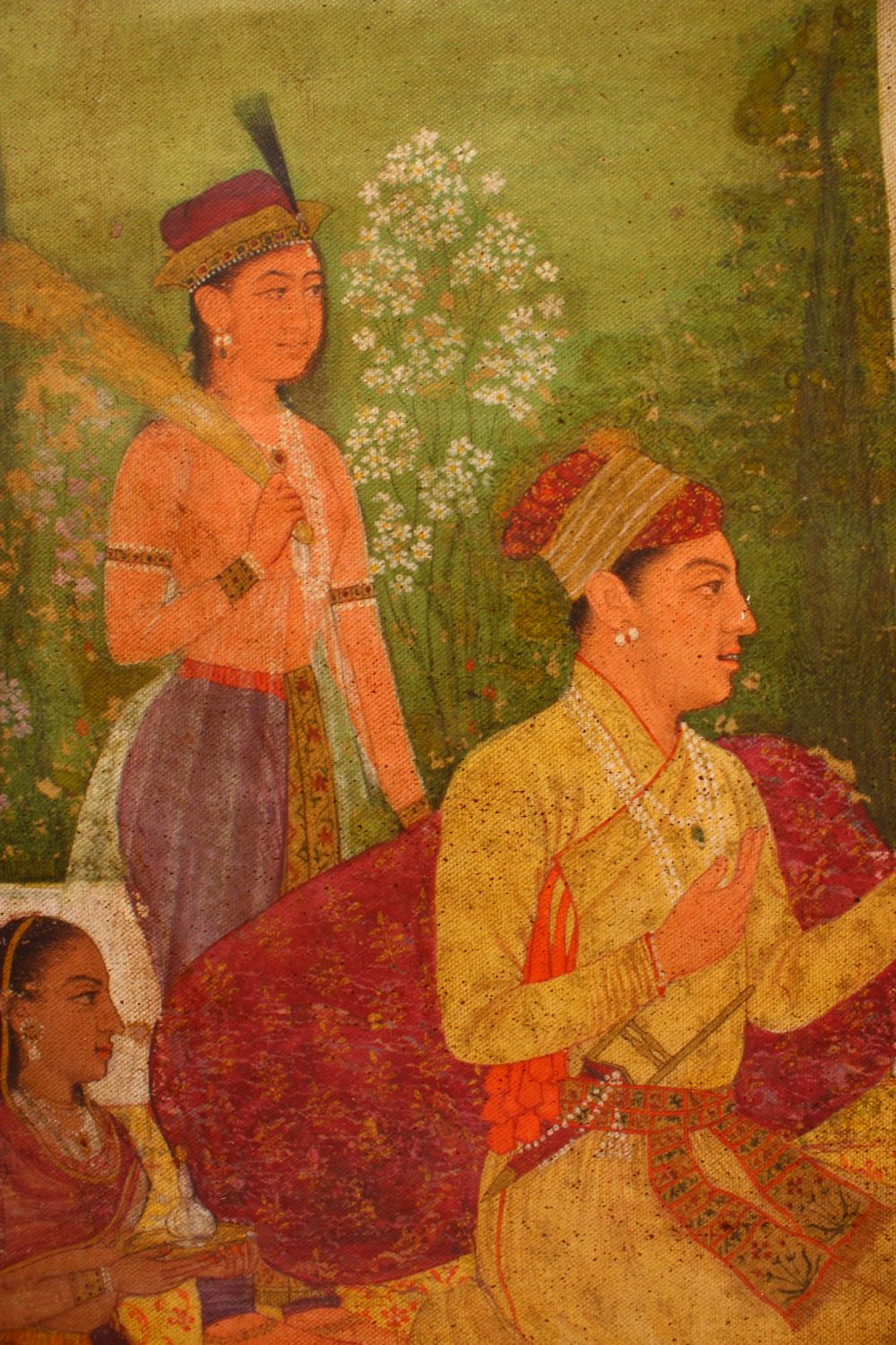 AN INDIAN PAINTING ON CANVASS OF PRINCE AND ATTENDANTS, seated in the garden having a picnic, 83cm x - Image 2 of 8