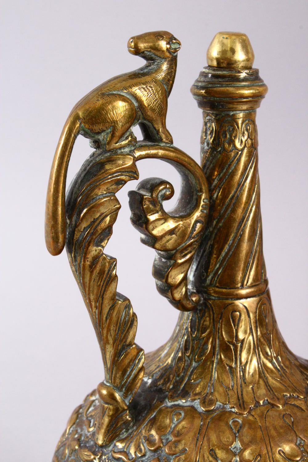 A 19TH CENTURY INDIAN SHIVA BRASS MOULDED EWER, with a stopper, the handle with an animal, the - Image 6 of 8