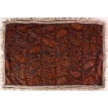 A 19TH CENTURY KASHMIR SHAWL FRAGMENT, with tassel, 107cm x 64cm