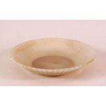 A FINE INDIAN CARVED WHITE JADE PETAL FORMED DISH, with ribbed body to simulate petal, 13cm