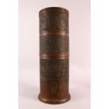A LARGE JAPANESE CYLINDRICAL BRONZE RELIEF VASE, with profusely decorated sides of native flora,