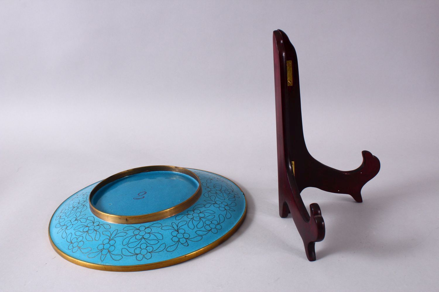 A CHINESE CLOISONNE PLATE & STAND - the dish with a royal blue ground with prunus decoration, 23cm. - Image 6 of 6