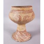 AN EARLY THAI BAN CHIANG POTTERY PEDESTAL VASE, with orange swirling motif, 19.5cm high x 15cm