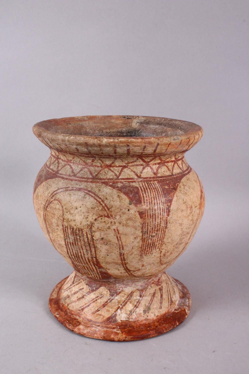 AN EARLY THAI BAN CHIANG POTTERY VASE, with stylized floral motif decoration, 15cm diameter x 16.5cm - Image 2 of 7