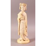 A LARGE AND FINE QUALITY JAPANESE MEIJI PERIOD CARVED ONE PIECE IVORY OKIMONO - BIJIN - the bijin