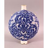 A TURKISH IZNIK BLUE & WHITE POTTERY WATER FLASK, with floral decoration, 23cm