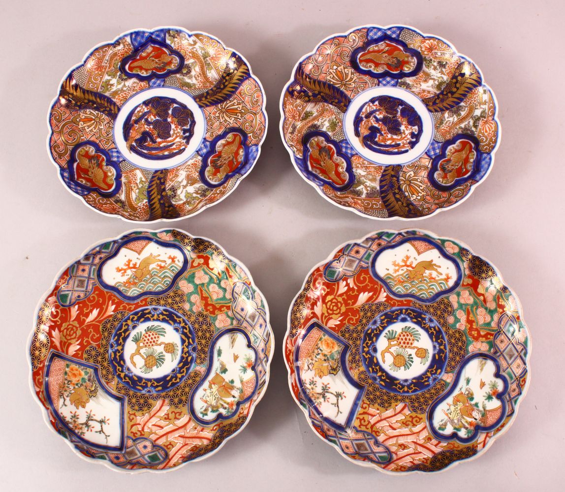 TWO PAIRS OF JAPANESE MEIJI PERIOD IMARI PORCELAIN PLATES, decorated with typical imari palate, with