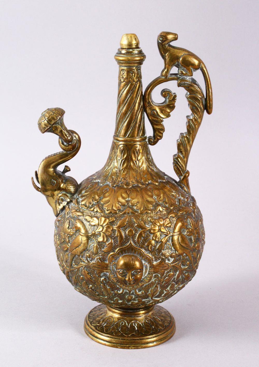 A 19TH CENTURY INDIAN SHIVA BRASS MOULDED EWER, with a stopper, the handle with an animal, the