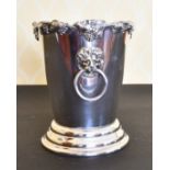 A SILVER PLATE TAPERING ICE BUCKET with lion ring handle.