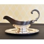 A PLATED OVAL SAUCE TUREEN WITH STAND.