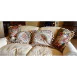 FOUR VARIOUS TAPESTRY COVERED CUSHIONS.