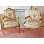 A GOOD LOUIS XVI STYLE GILTWOOD SUITE with tapestry covers, comprising settee and pair of