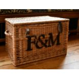 AN R & M WICKER BASKET. 1ft 10ins long.