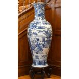 A LARGE CHINESE PORCELAIN BLUE AND WHITE VASE OF KANG HSI DESIGN with many figures and emblems, on a