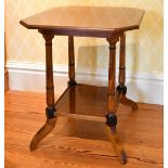 A VICTORIAN MAHOGANY SQUARE TOP TWO TIER TABLE with canted corners on turned legs. 1ft 11ins wide.