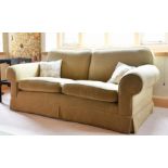 A DEEP EASY TWO-SEATER SETTEE. 6ft 8ins long.