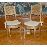 TWO GILT CANE SEATED CHAIRS.