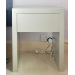 A PAIR OF MODERN SILVERED BEDSIDE TABLES.