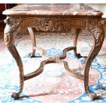 A GOOD FRENCH VEINED MARBLE TOP CENTRE TABLE with serpentine sides, on a wooden stand with carved