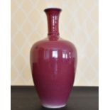 A LARGE CHINESE PINK MOTTLED VASE. 16ins high.