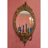 A PAIR OF VICTORIAN COMPOSITION GILT OVAL WALL MIRROR GIRANDOLES, CIRCA. 1890, each with three