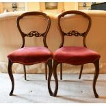 A SET OF FOUR VICTORIAN CABRIOLE LEG CHAIRS.
