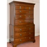 A GEORGE III MAHOGANY TALLBOY with dentil cornice, the top with two short and three long drawers,