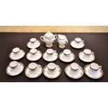 A SET OF TWELVE WEDGWOOD BONE CHINA CUPS AND SAUCERS, along with a sugar basin and milk jug (26).